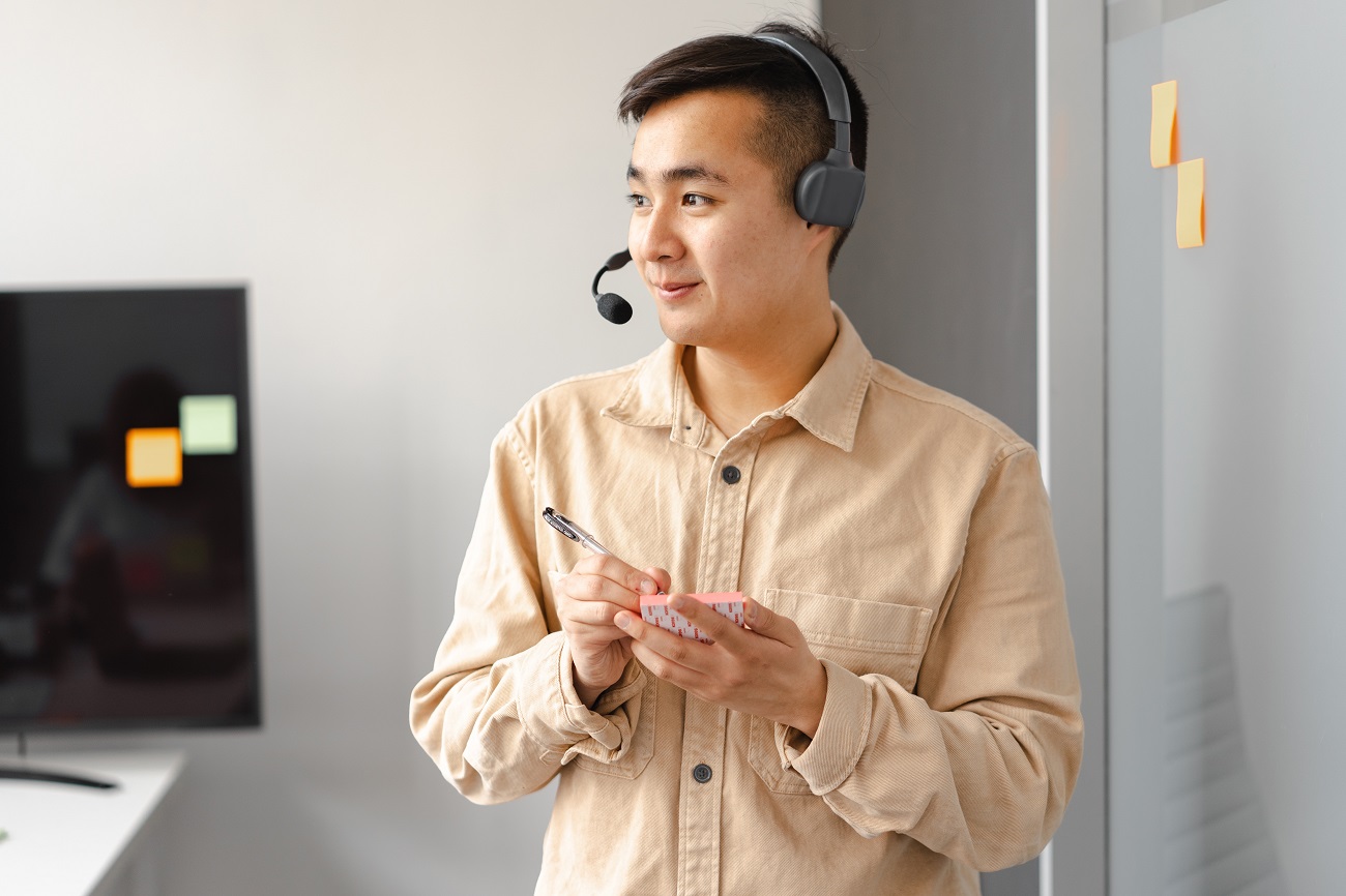 Call center agent taking notes
